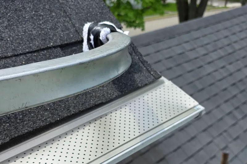 Gutter screening fitted to a curved roofline by Nature Guard Gutters